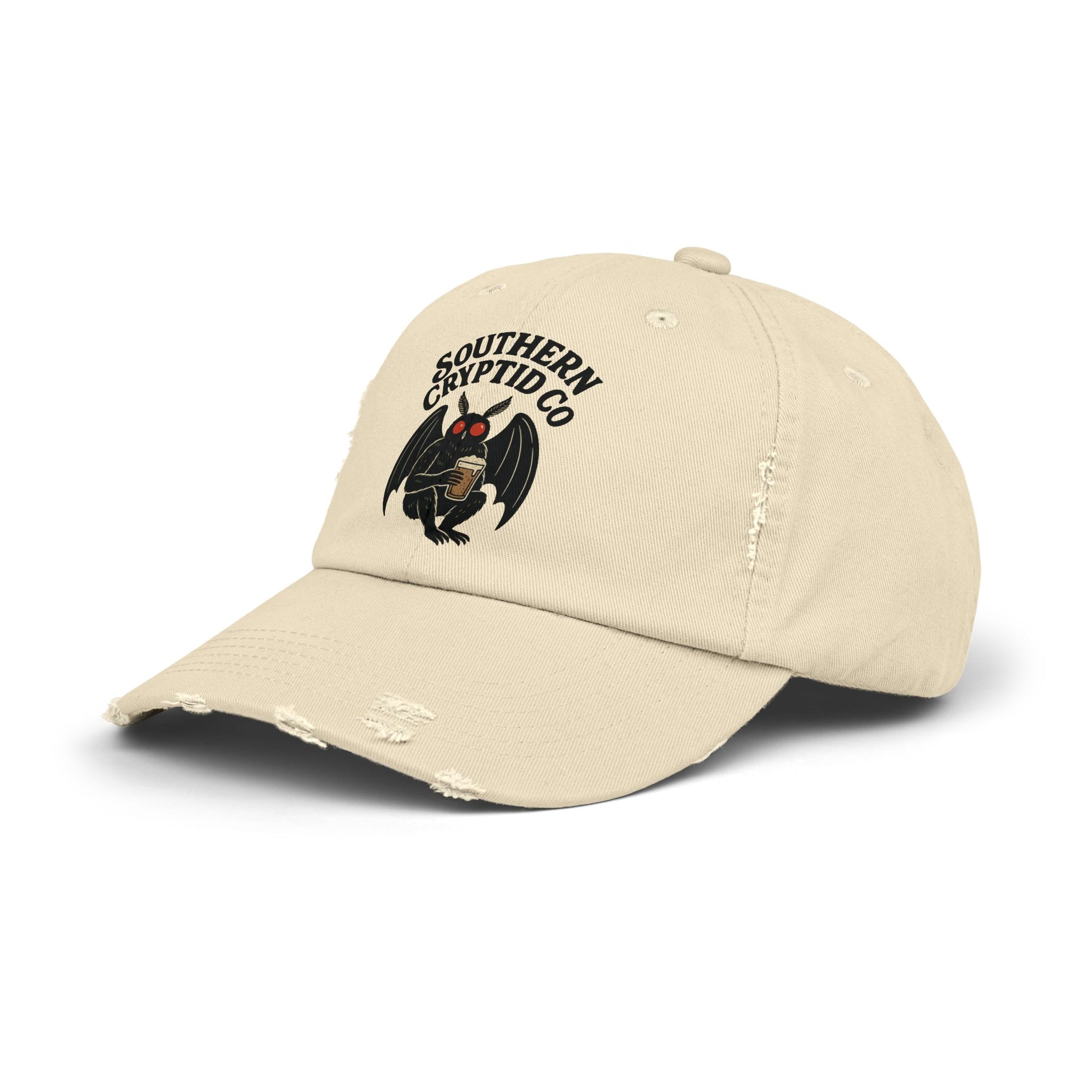 Distressed dad hat with Southern Cryptid Co. logo featuring Mothman holding a pint of beer.
