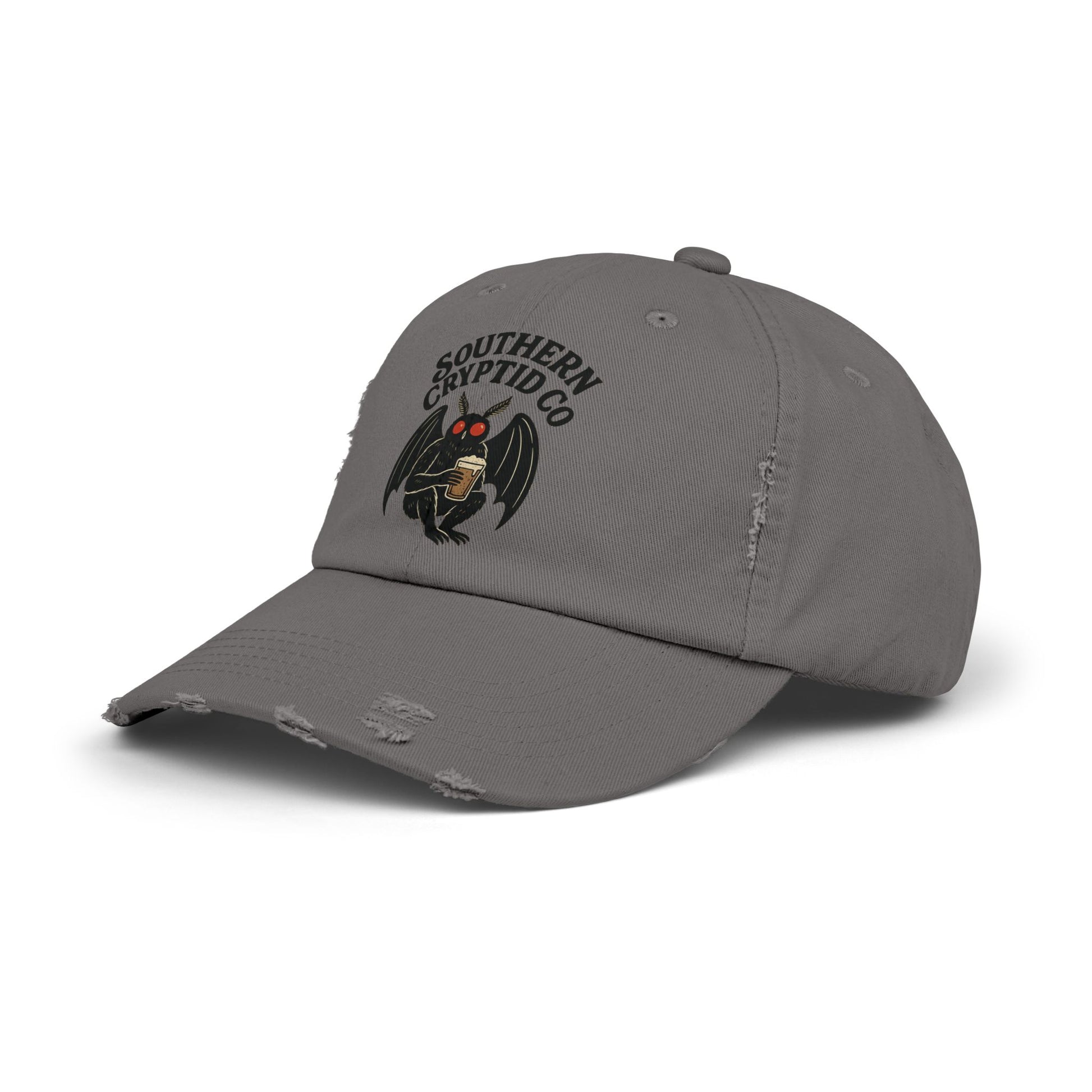 Distressed dad hat with Southern Cryptid Co. logo featuring Mothman holding a pint of beer.