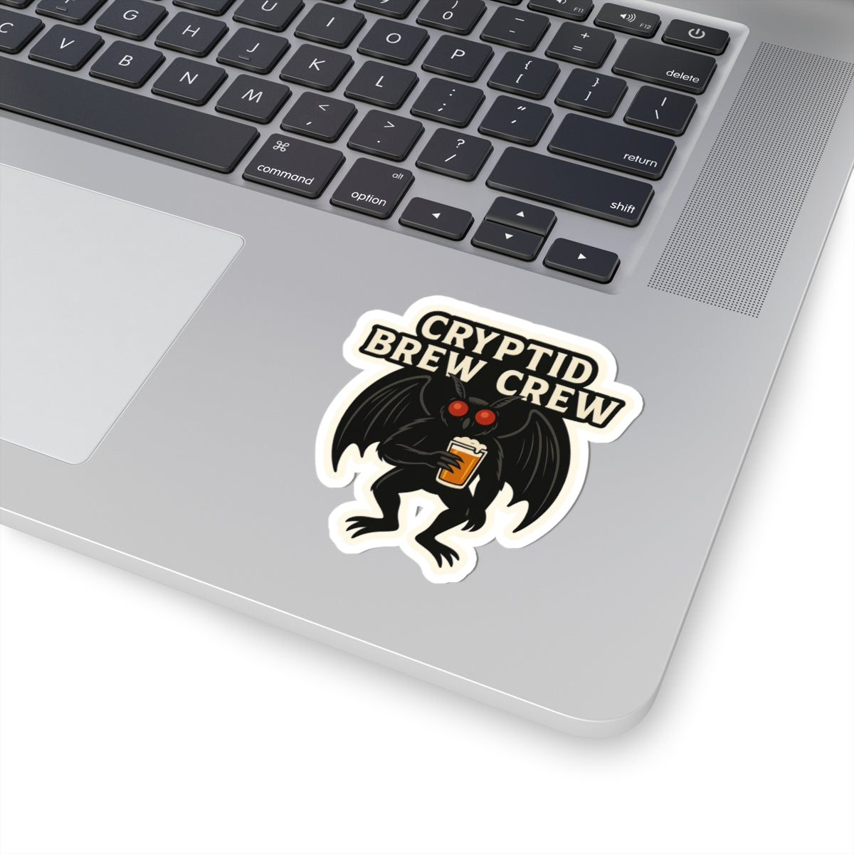 Spooky cryptid sticker featuring Mothman with a beer, perfect for laptops, water bottles, and coolers