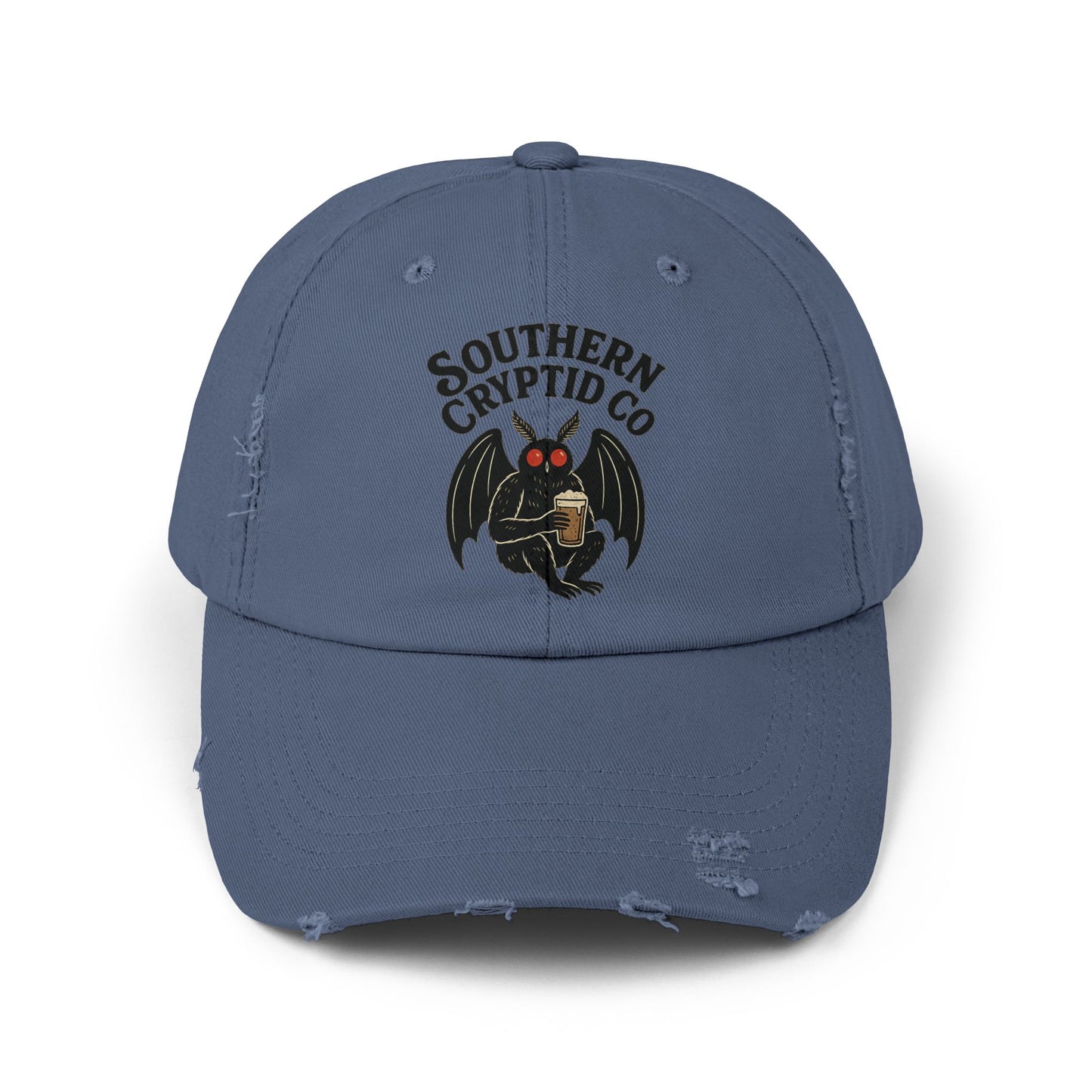 Distressed dad hat with Southern Cryptid Co. logo featuring Mothman holding a pint of beer.