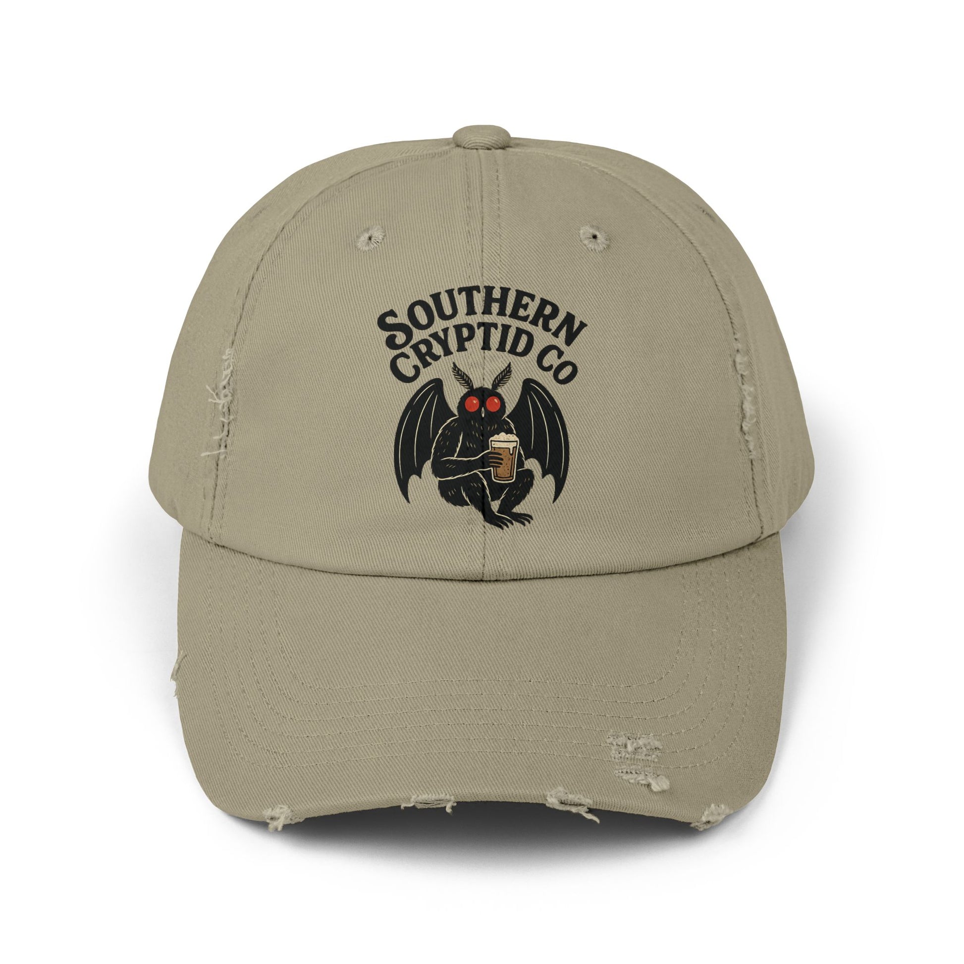 Distressed dad hat with Southern Cryptid Co. logo featuring Mothman holding a pint of beer.